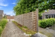 Rustig gelegen halfopen bebouwing met garage te Rumbeke!