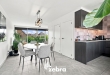 Lichtrijke bel-etage met terras en ruime garage in Assebroek!