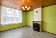 Te renoveren woning met 3 slaapkamers, kelder en zuidwestgerichte stadskoer in Tielt!