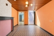 Te renoveren woning met 3 slaapkamers, kelder en zuidwestgerichte stadskoer in Tielt!