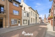 Te renoveren woning met 3 slaapkamers, kelder en zuidwestgerichte stadskoer in Tielt!