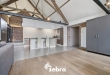 Unieke instapklare loft met twee ruime terrassen, garage en privatieve parkeerplaats in Ardooie!