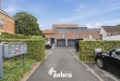 Unieke instapklare loft met twee ruime terrassen, garage en privatieve parkeerplaats in Ardooie!