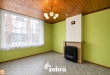 Te renoveren woning met 3 slaapkamers, kelder en zuidwestgerichte stadskoer in Tielt!
