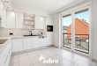 Zeer ruim appartement (137 m²) te koop met dubbele garage in het hartje van Tielt!