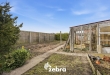 Te renoveren woning op ruim perceel in Eernegem!
