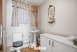 Te renoveren woning op ruim perceel in Eernegem!