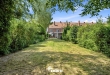 Stevige woning met fantastische tuin in Roeselare!