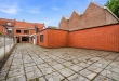 Ruime woning met 4 slaapkamers en tuin te Oostrozebeke!