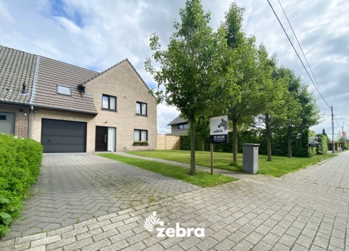 Halfopen bebouwing met 4 slaapkamers en zonovergoten tuin te Beveren!