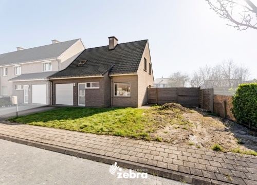 Instapklare, halfopen woning met 3 slaapkamers in een rustige woonwijk te Wevelgem!
