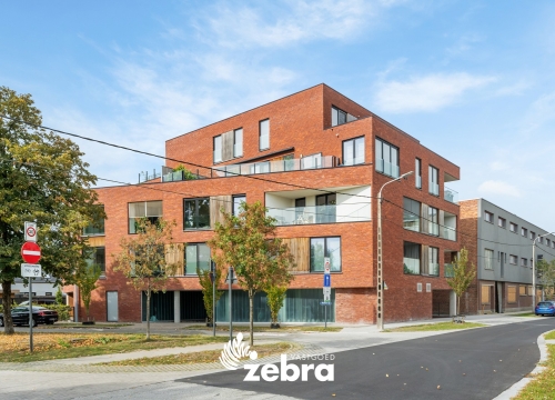 Recent tweeslaapkamerappartement met autostaanplaats vlak bij centrum Roeselare!
