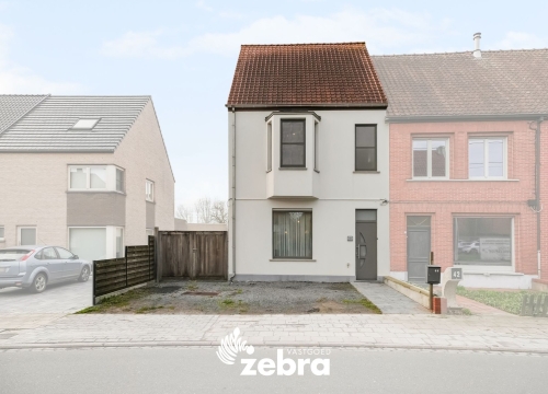 Instapklare woning met drie slaapkamers en ruime oprit en tuinhuis te Tielt!