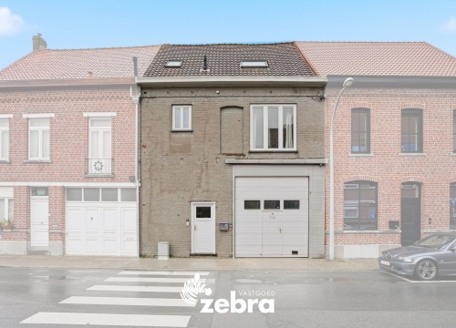 Woning met magazijn te Heule!