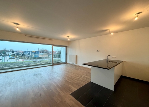 Instapklaar tweeslaapkamerappartement met terras & autostaanplaats te Brugge!