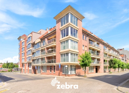 Lichtrijk 2-slaapkamerappartement met terras en staanplaats te centrum Kortrijk!