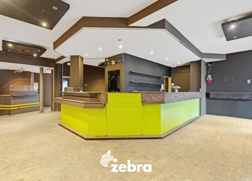 Ruim handelspand met duplex-appartement gelegen op een commerciële ligging te Kuurne!