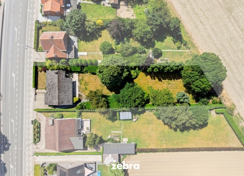 Ruim perceel bouwgrond met mogelijkheden voor sloop en heropbouw nabij het centrum van Tielt!