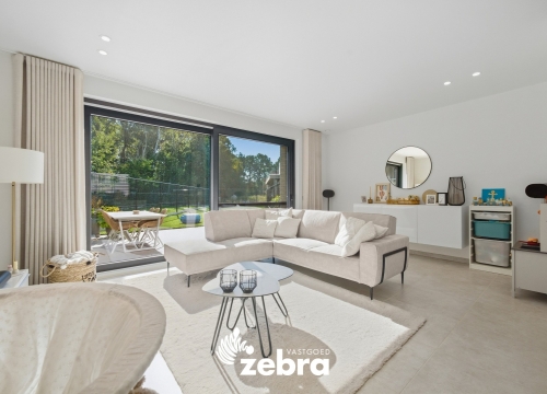 BEN-woning met zuidgerichte tuin en carport te Oostakker!