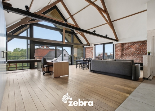 Unieke instapklare loft met twee ruime terrassen, garage en privatieve parkeerplaats in Ardooie!