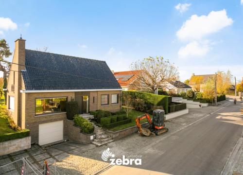 Vrijstaande villa met vergezicht op een perceel van 1038 m² te Heule!