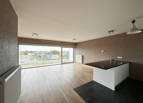 Instapklaar tweeslaapkamerappartement met terras & autostaanplaats te Brugge!