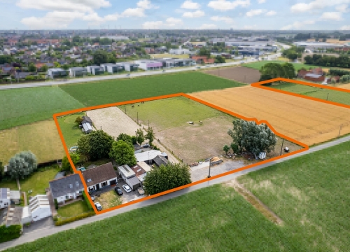 Te renoveren hoeve op een perceel van 15.352 m² nabij centrum Roeselare!