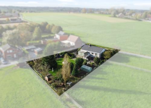 Open bebouwing met 3 slaapkamers, ruime tuin & garage te Aarsele (Tielt)
