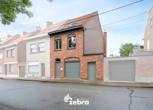 Gezinswoning met 4 slaapkamers, garage & zuidgerichte tuin te Roeselare!