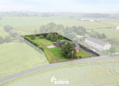 Alleenstaande woning met groot perceel op een landelijke locatie te Dentergem!