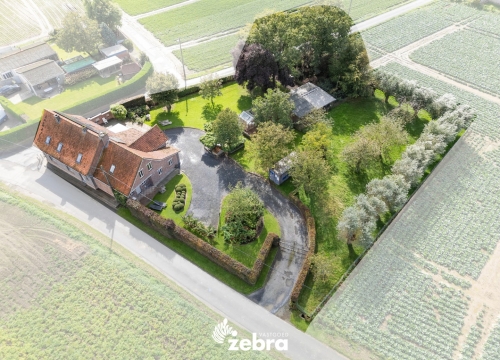 Alleenstaande woning op ruim perceel te Tielt!