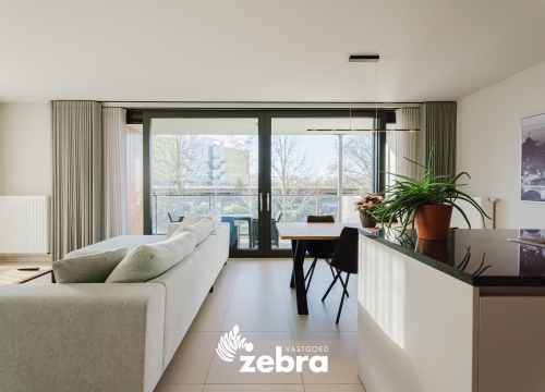 Recent appartement met twee slaapkamers en ondergrondse autostaanplaats te Brugge!