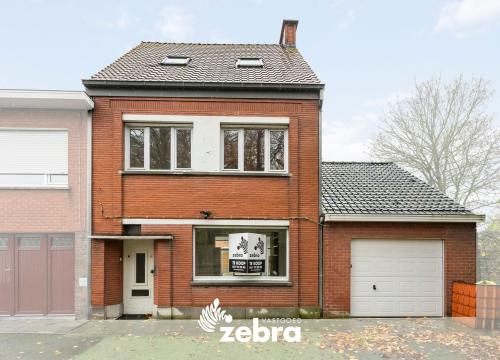 Centraal gelegen woning met 4 slaapkamers en garage in Tielt