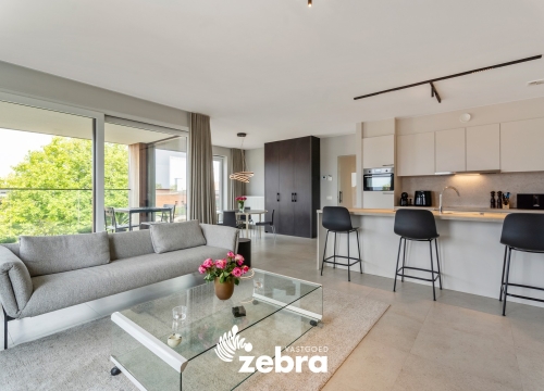 Recent tweeslaapkamerappartement met autostaanplaats vlak bij centrum Roeselare!
