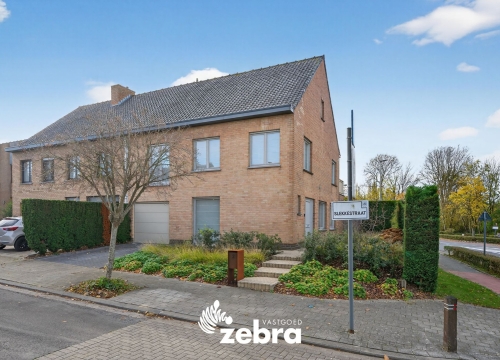 Energiezuinige halfopen bebouwing met zuidwestgerichte tuin te Kortrijk (Marke)!