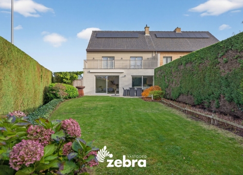 Energiezuinige halfopen bebouwing met zuidwestgerichte tuin te Kortrijk (Marke)!