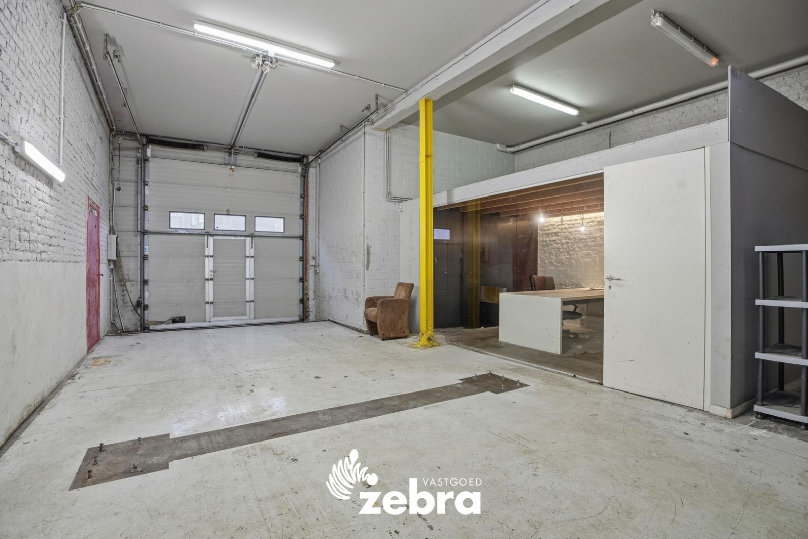 Woning met magazijn te Heule!