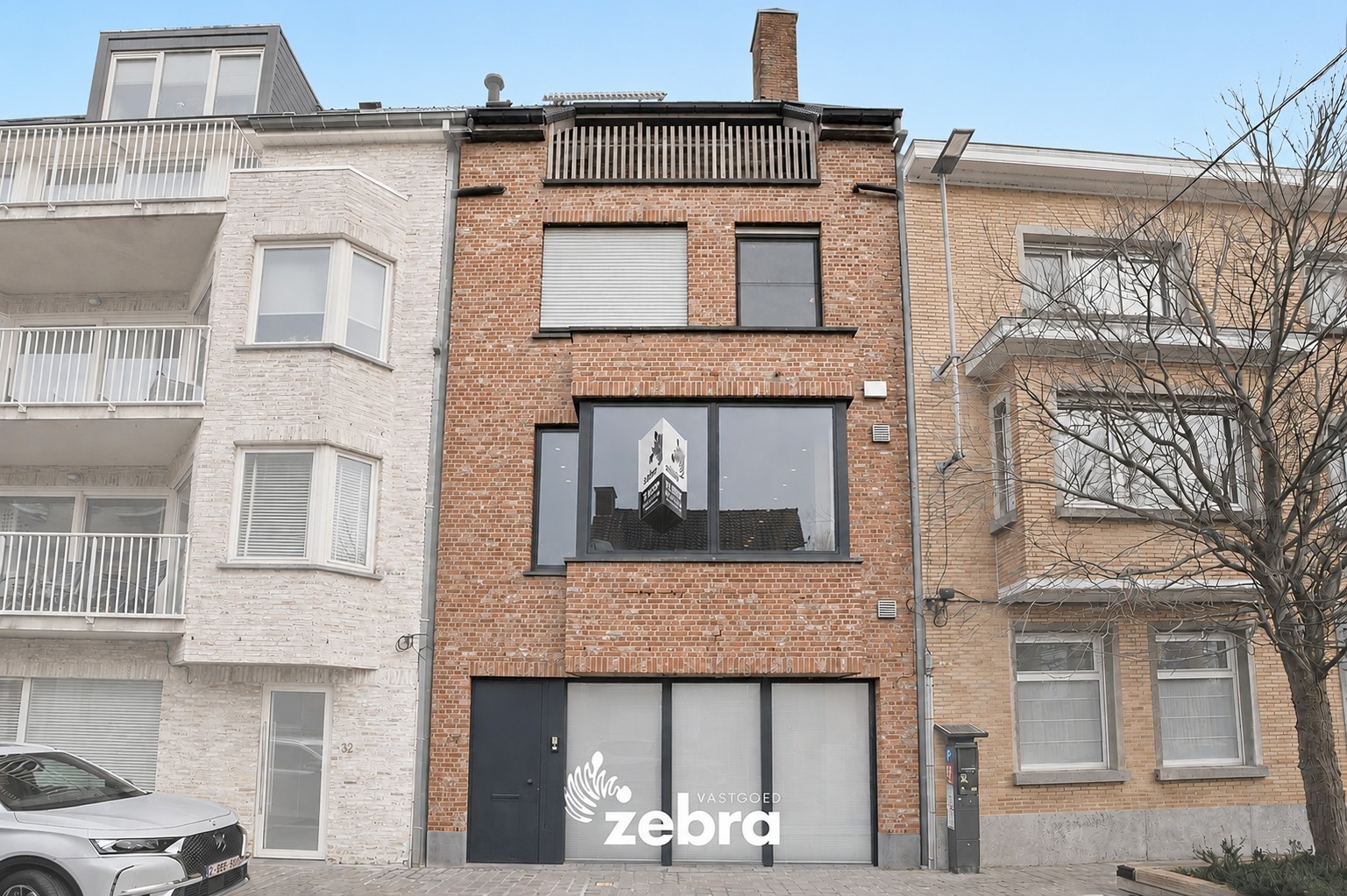 Eigentijdse woning met lift, terras en topafwerking in het centrum van Roeselare!