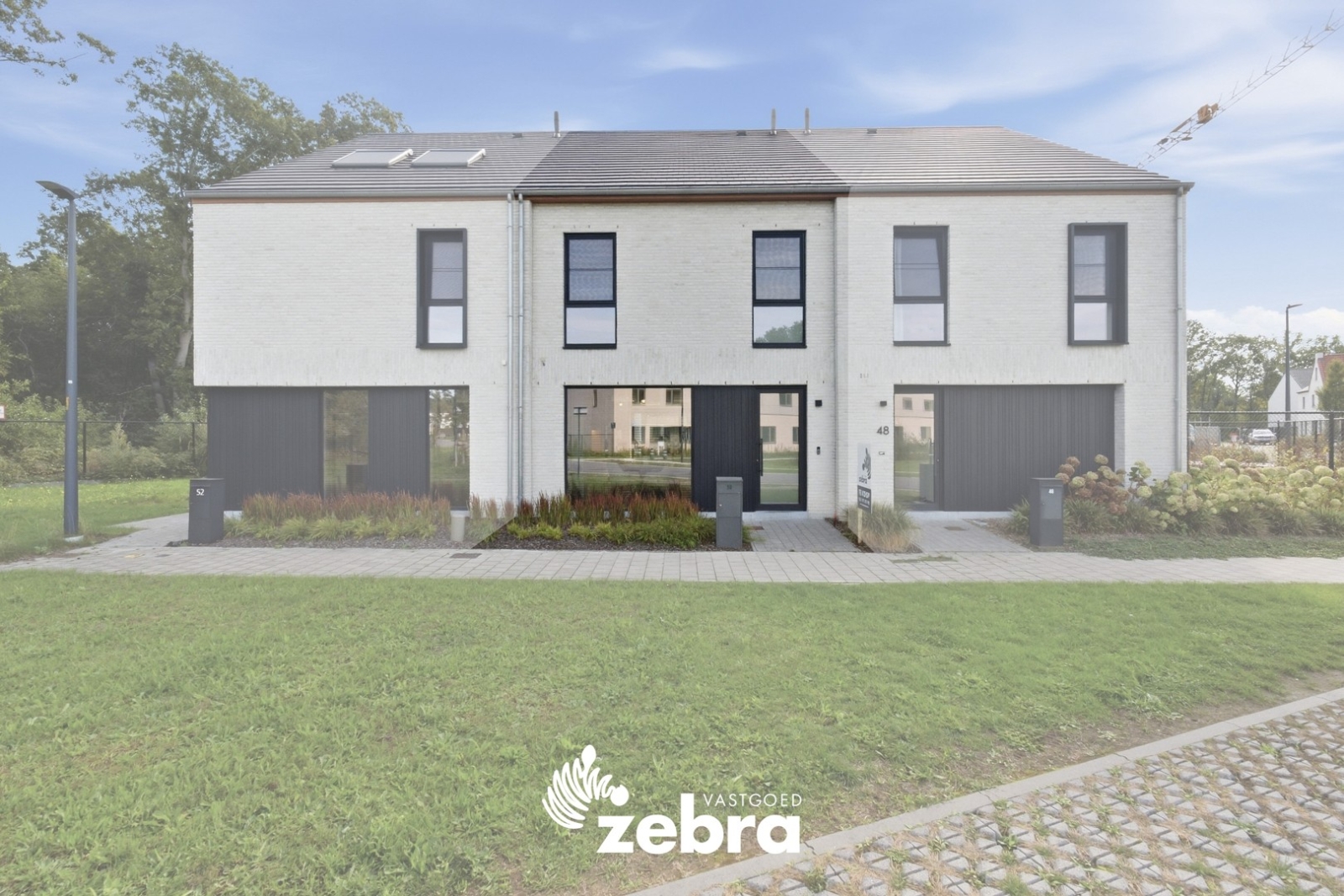 BEN-woning met zuidgerichte tuin en carport te Oostakker!