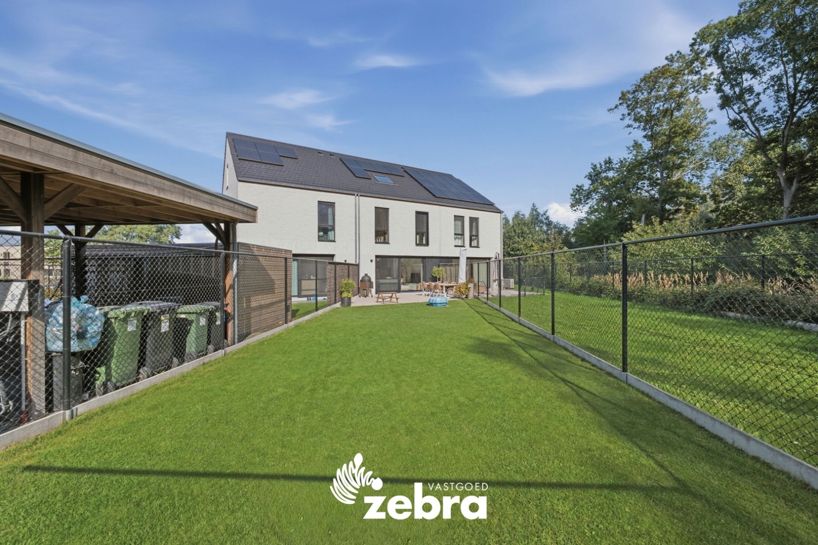 BEN-woning met zuidgerichte tuin en carport te Oostakker!