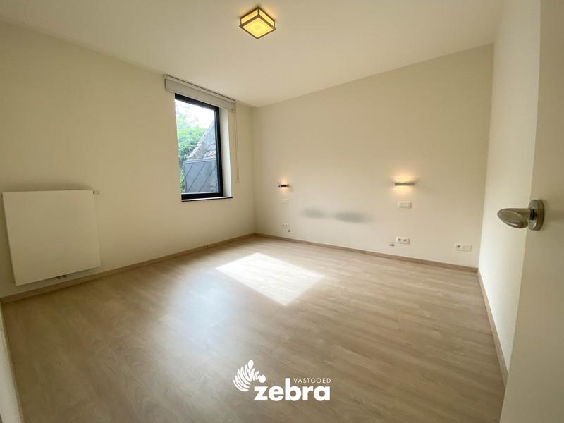 Energiezuinig 3-slaapkamer appartement met parkeerplaats te Kortrijk centrum!
