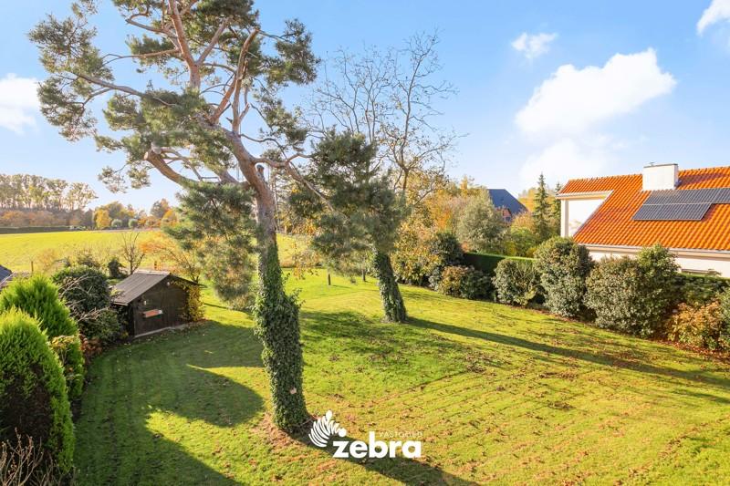 Vrijstaande villa met vergezicht op een perceel van 1038 m² te Heule!