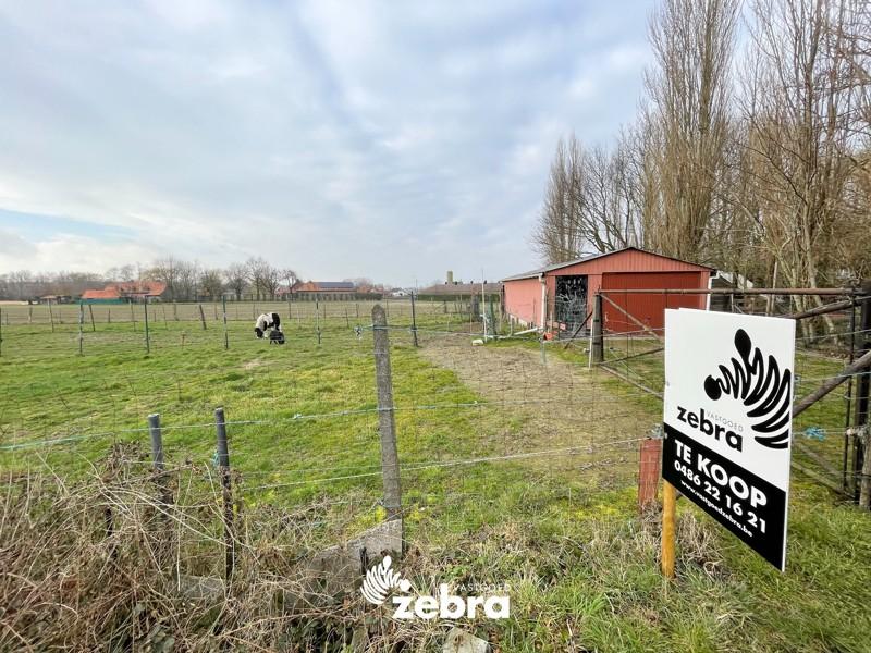 Rustig gelegen landbouwgrond met een oppervlakte van 1500 m² te Moorslede!
