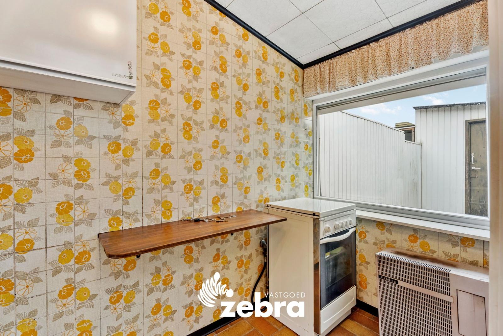 Te renoveren rijwoning met 3 slaapkamers en uitweg te Roeselare (Rumbeke)!