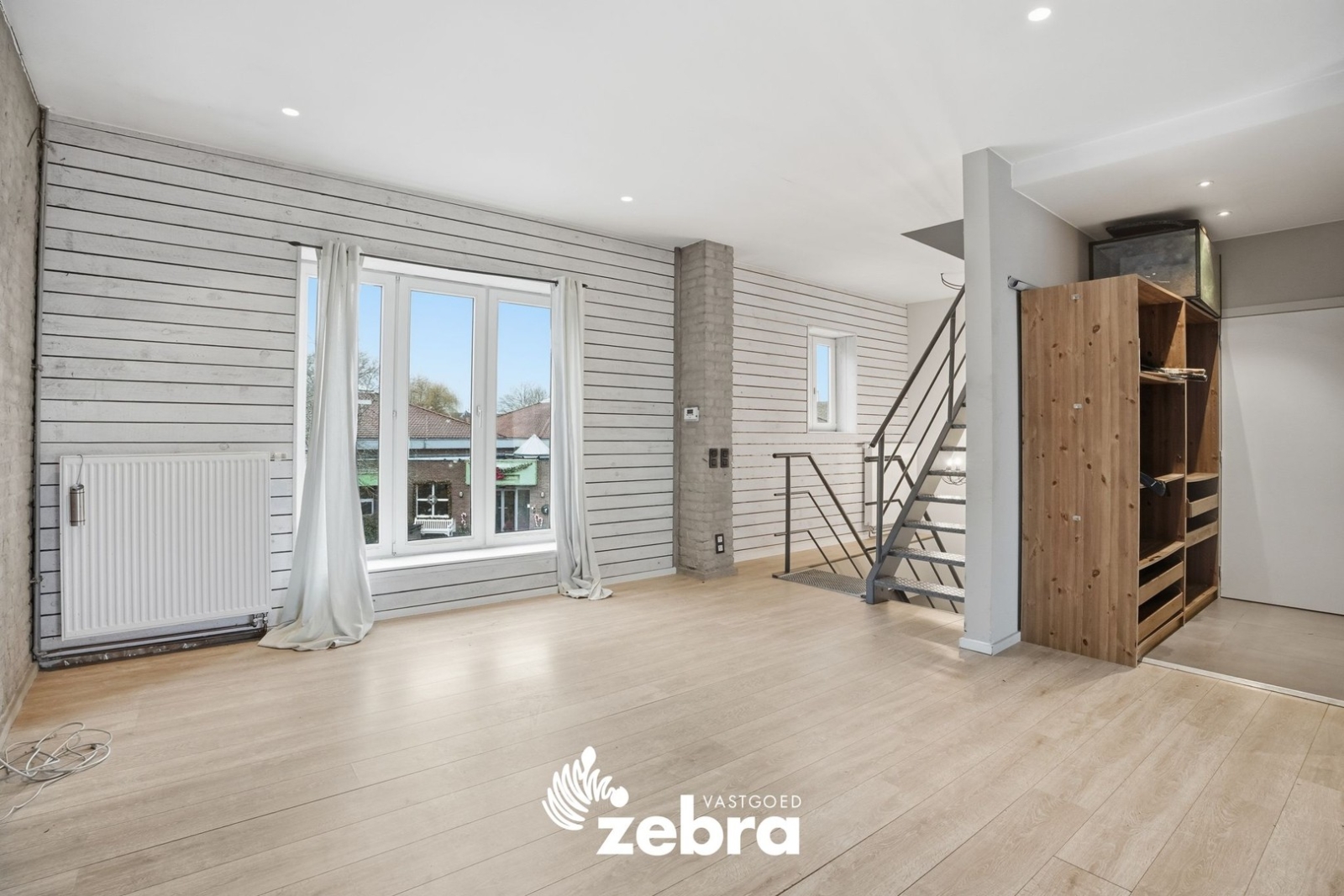 Woning met magazijn te Heule!