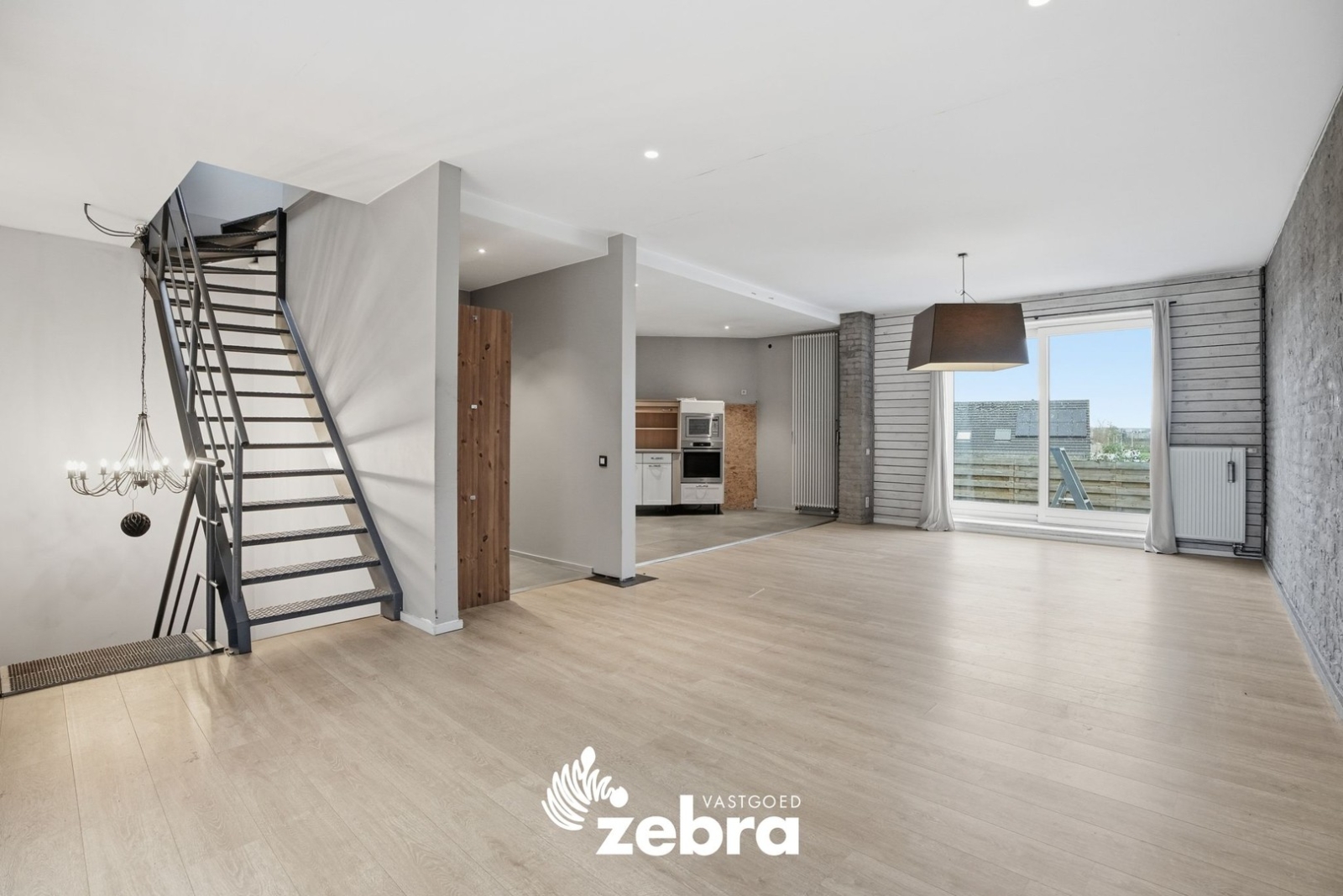 Woning met magazijn te Heule!
