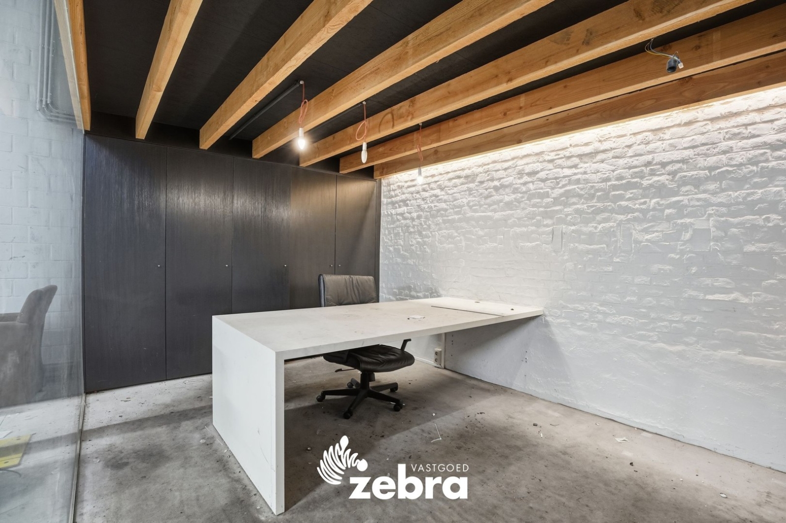 Woning met magazijn te Heule!