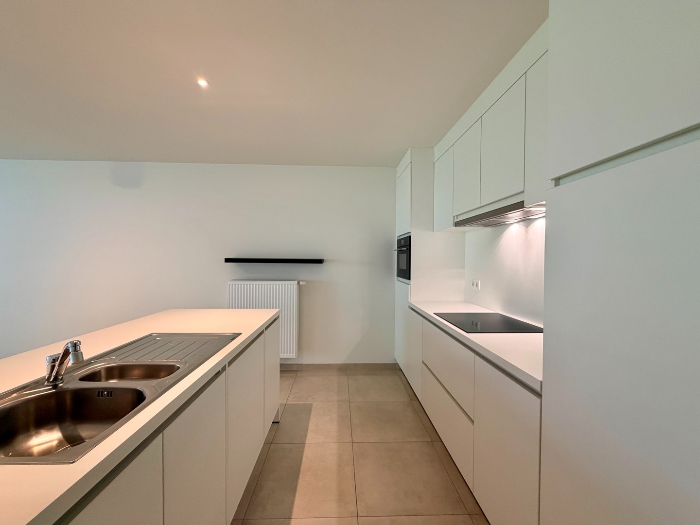 Gelijkvloers nieuwbouwappartement met voor- & achtertuin te Tielt (Meulebeke)!