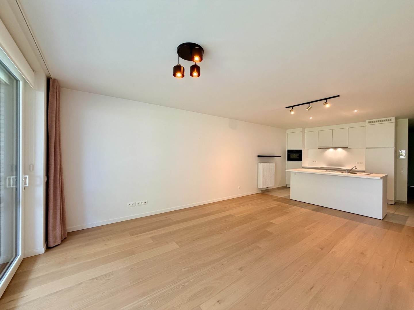 Gelijkvloers nieuwbouwappartement met voor- & achtertuin te Tielt (Meulebeke)!