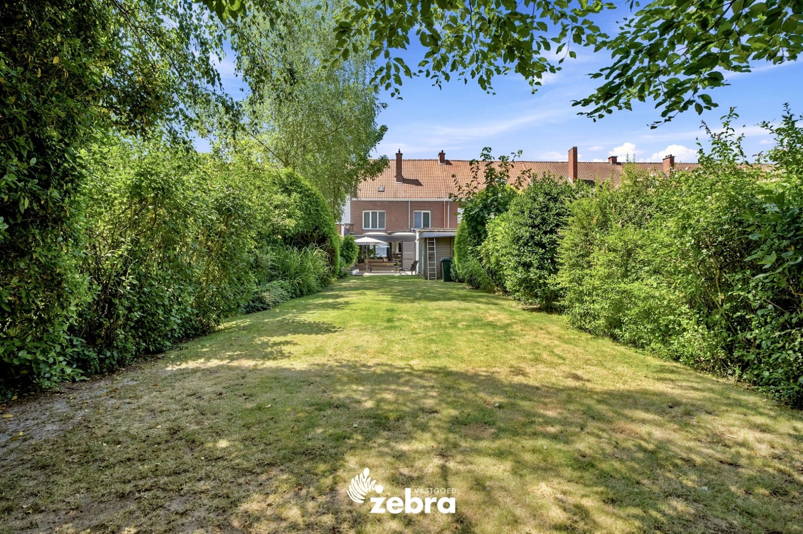 Stevige woning met fantastische tuin in Roeselare!